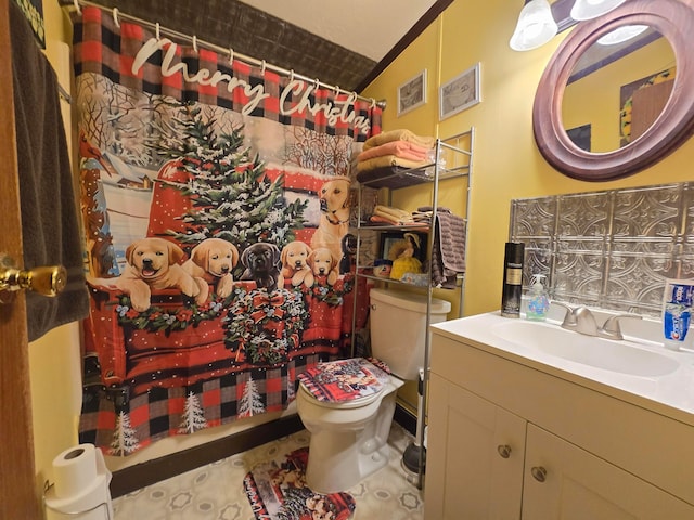 bathroom with a shower with shower curtain, vanity, tile patterned flooring, toilet, and lofted ceiling