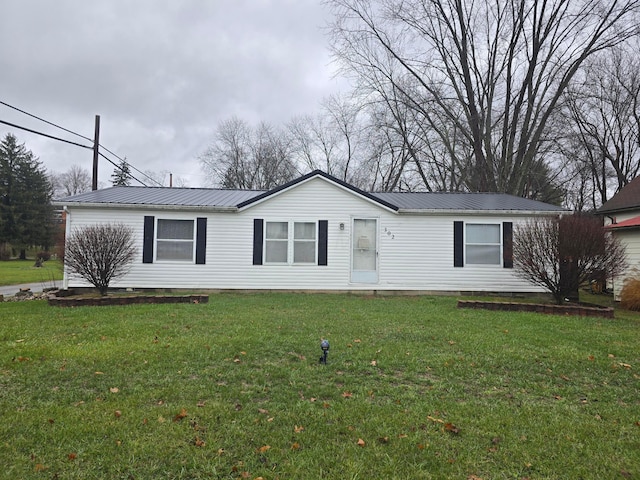 view of front of property with a front lawn