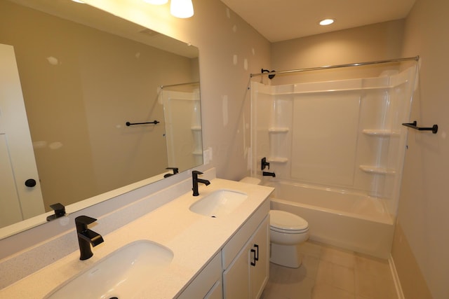 full bathroom featuring toilet, shower / tub combination, double vanity, and a sink