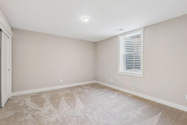 empty room featuring carpet