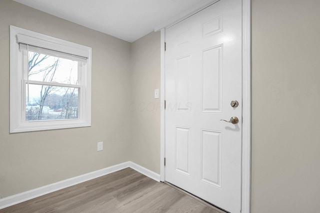 entryway with light hardwood / wood-style flooring