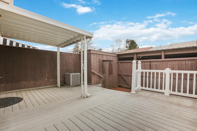 wooden deck featuring central AC