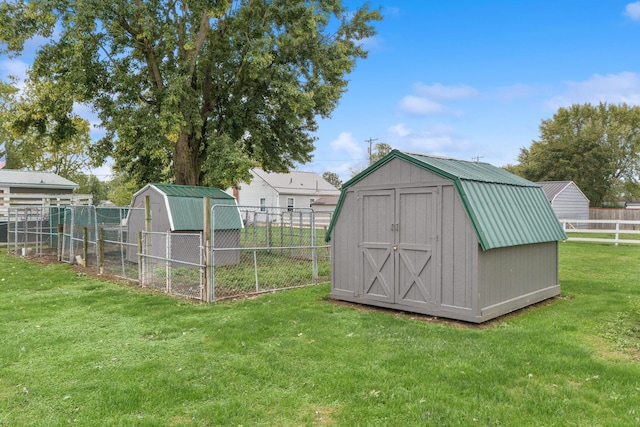 view of outdoor structure with a yard