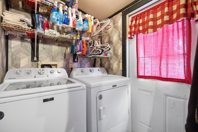 washroom with washer and clothes dryer