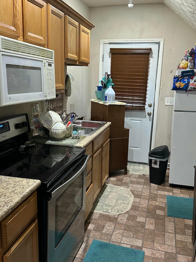 kitchen featuring white appliances