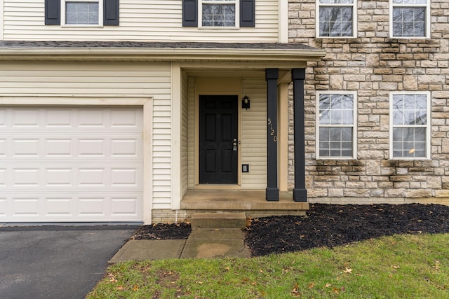 property entrance featuring a garage