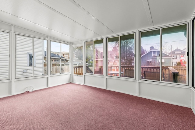 unfurnished sunroom with a healthy amount of sunlight