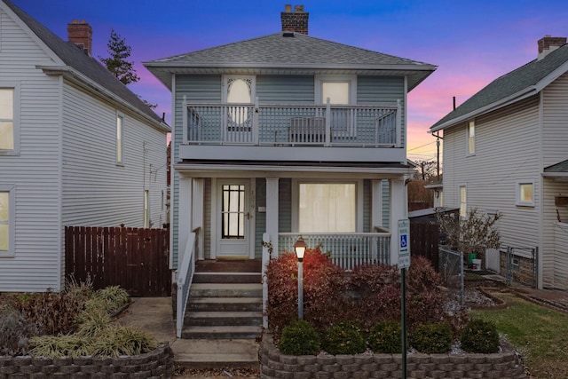 front of property with a balcony