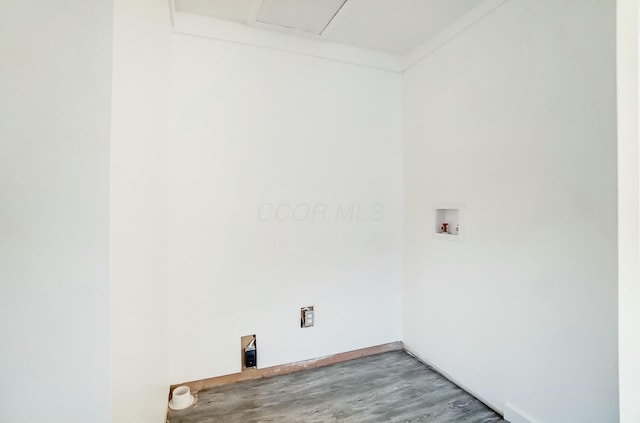 laundry room featuring hookup for a washing machine, ornamental molding, and hardwood / wood-style floors