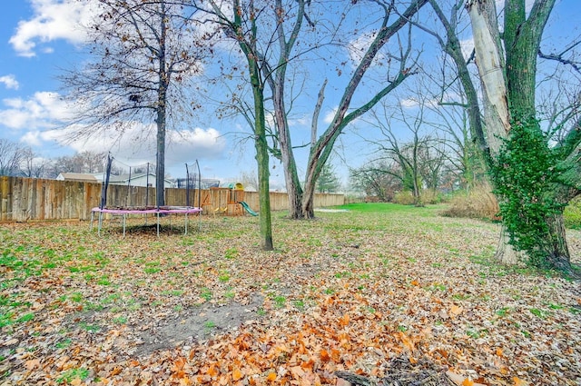 view of yard featuring a trampoline