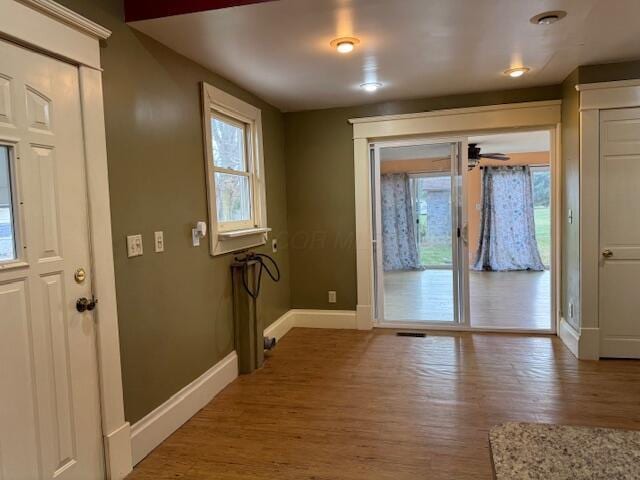 doorway to outside with hardwood / wood-style flooring