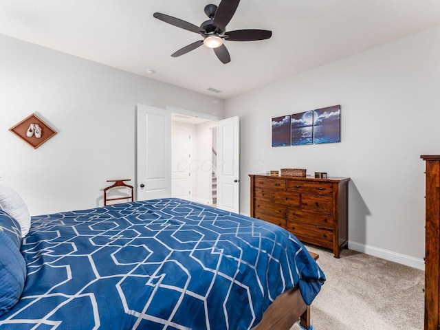 bedroom featuring ceiling fan and carpet flooring