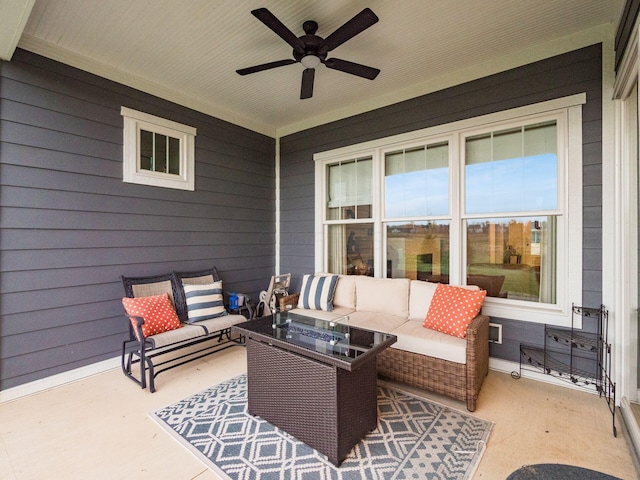 view of patio with an outdoor living space with a fire pit and ceiling fan