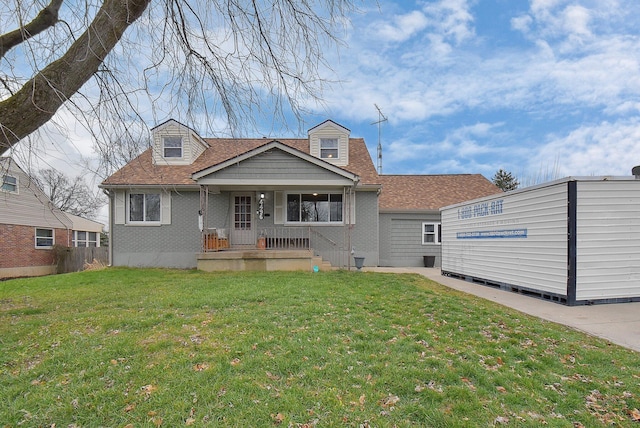 view of front of house with a front lawn and covered porch