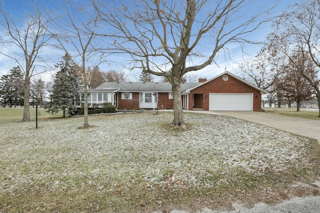 6015 Lithopolis Winchester Rd, Canal Winchester, OH 43110 - view of front of property featuring a garage, a chimney, driveway, and brick siding