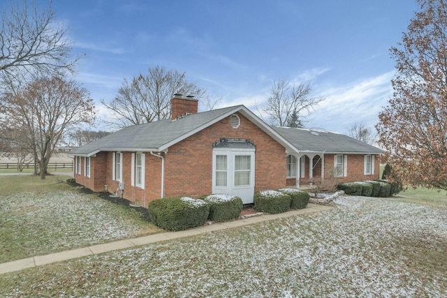 6015 Lithopolis Winchester Rd, Canal Winchester, OH 43110 - view of front of home with brick siding, a chimney, and a shingled roof