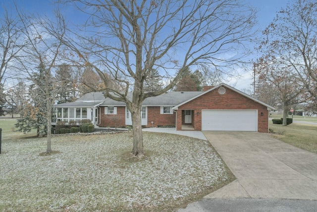 ranch-style home featuring a garage