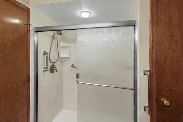 bathroom featuring walk in shower