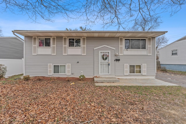 bi-level home with a patio