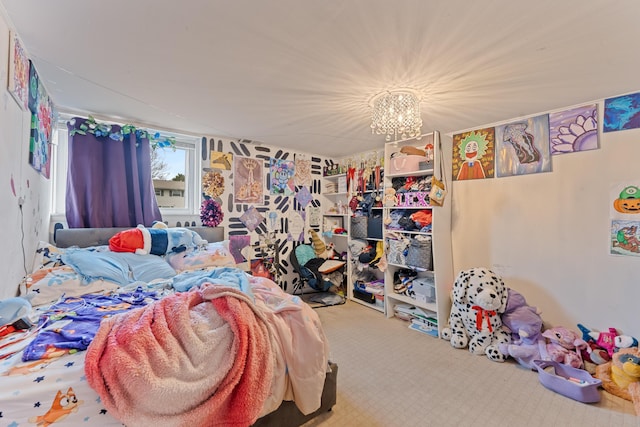 bedroom featuring carpet and a chandelier