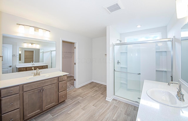 9809 Glenfield Ave Lot 2, Plain City, OH 43064 - full bath with a shower stall, two vanities, and wood finished floors