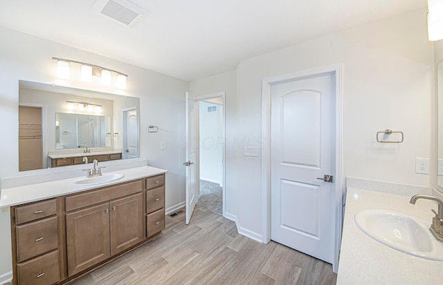 9809 Glenfield Ave Lot 2, Plain City, OH 43064 - bathroom with wood finished floors and two vanities