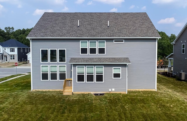 9809 Glenfield Ave Lot 2, Plain City, OH 43064 - back of house with a lawn and roof with shingles
