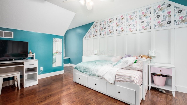 bedroom featuring vaulted ceiling, ceiling fan, and dark wood-type flooring