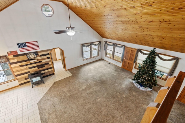 living room featuring ceiling fan, high vaulted ceiling, and wooden ceiling