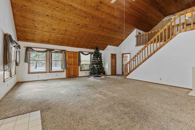 unfurnished living room with light colored carpet, high vaulted ceiling, ceiling fan, and wooden ceiling