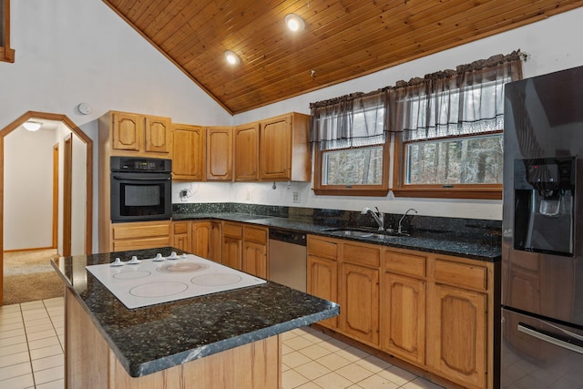 kitchen with white electric stovetop, refrigerator with ice dispenser, dishwasher, oven, and light tile patterned flooring