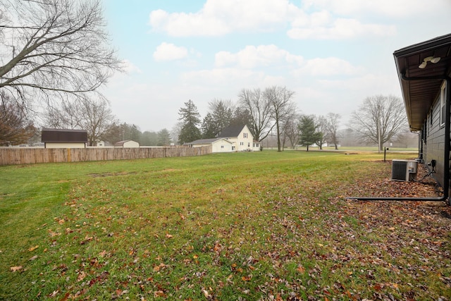 view of yard featuring central AC unit