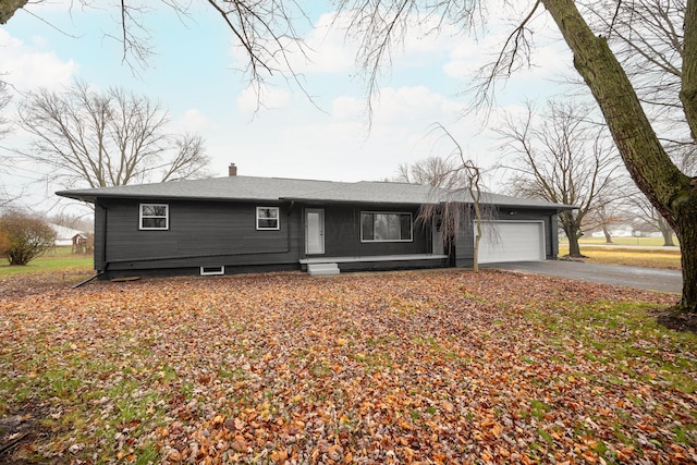 single story home with a garage