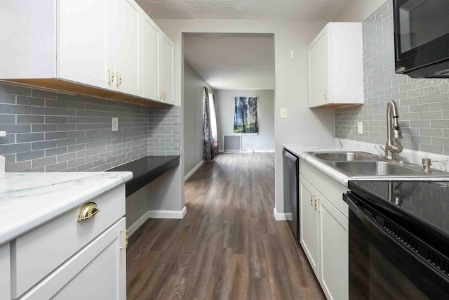 kitchen with white cabinetry, sink, dark hardwood / wood-style floors, backsplash, and black appliances