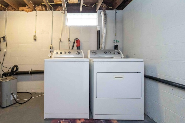 washroom featuring washer and dryer