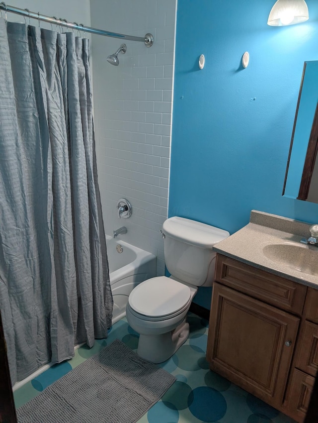 full bathroom featuring toilet, shower / tub combo, and vanity