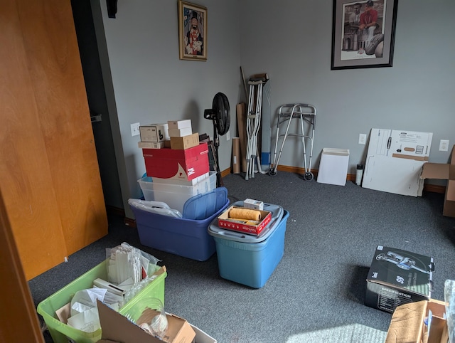 playroom featuring carpet flooring and baseboards