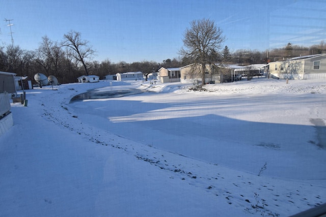 view of snowy yard