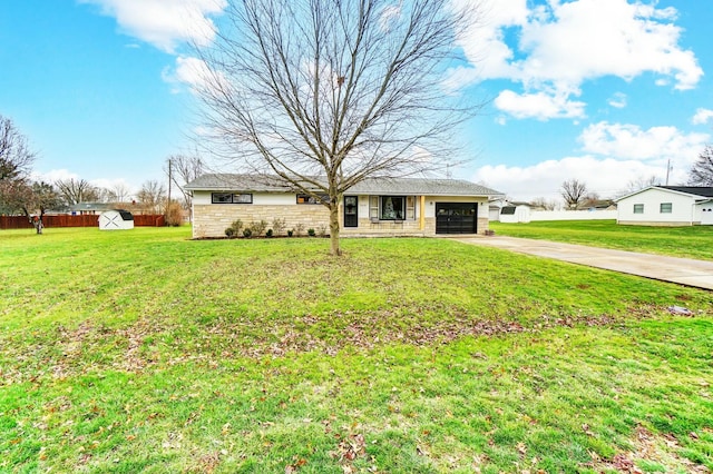 ranch-style house with a garage and a front yard