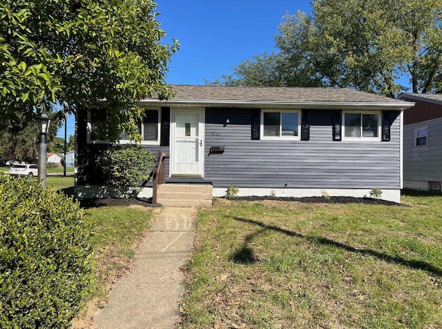 view of front facade with a front yard