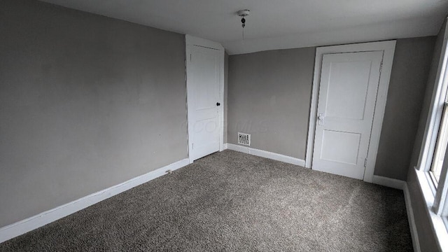 unfurnished bedroom featuring carpet