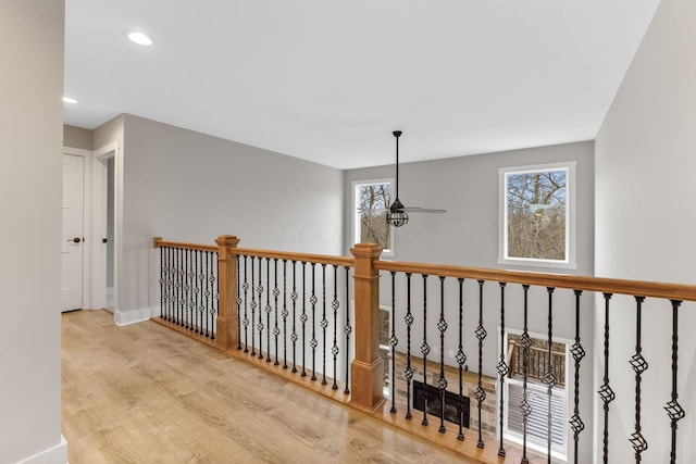 hall with light hardwood / wood-style flooring