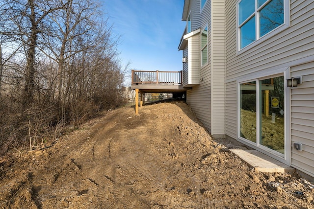 view of yard with a deck