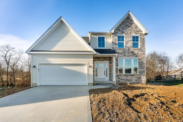 view of front of property featuring a garage