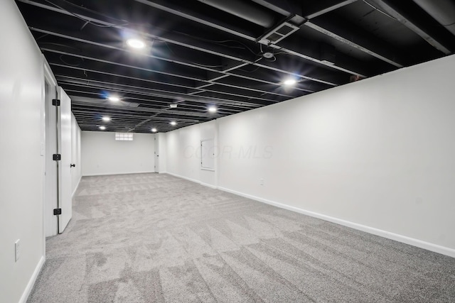 basement featuring carpet floors