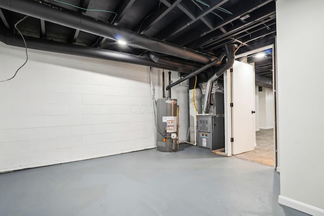 basement featuring gas water heater and heating unit