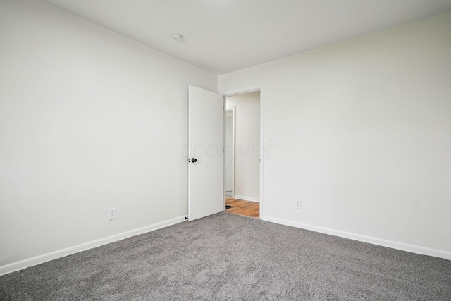 unfurnished room with carpet