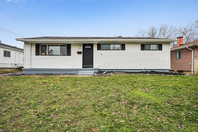 ranch-style house with a front yard