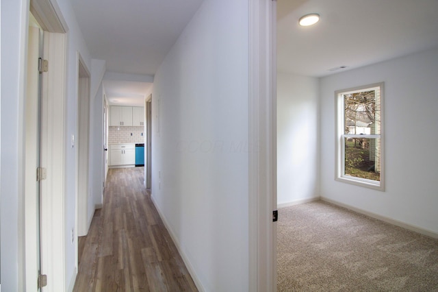 hallway featuring dark hardwood / wood-style floors