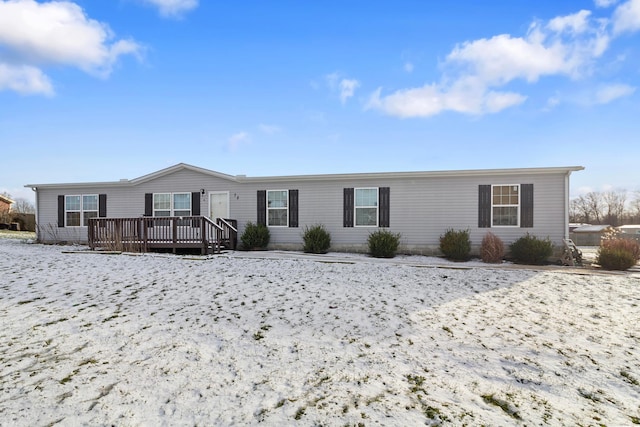 view of front of house with a deck